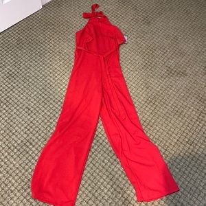 Bebe red halter neck jumpsuit size 10 new with tags